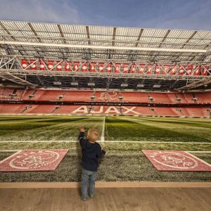 Voetbal stadion op behang